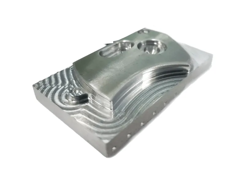 Aluminium knife scale after first-side machining, free-form surface milled in 3 axes